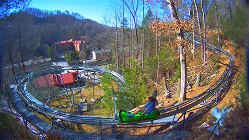 people riding a roller coaster